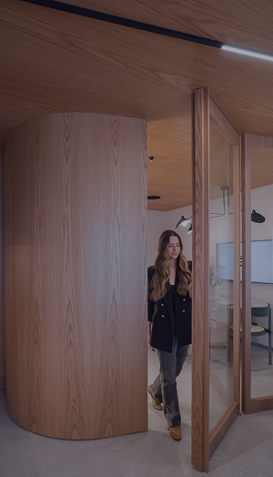 Workplace Index 2026 – person walking through modern office