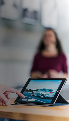 Visitor checking in on a tablet kiosk